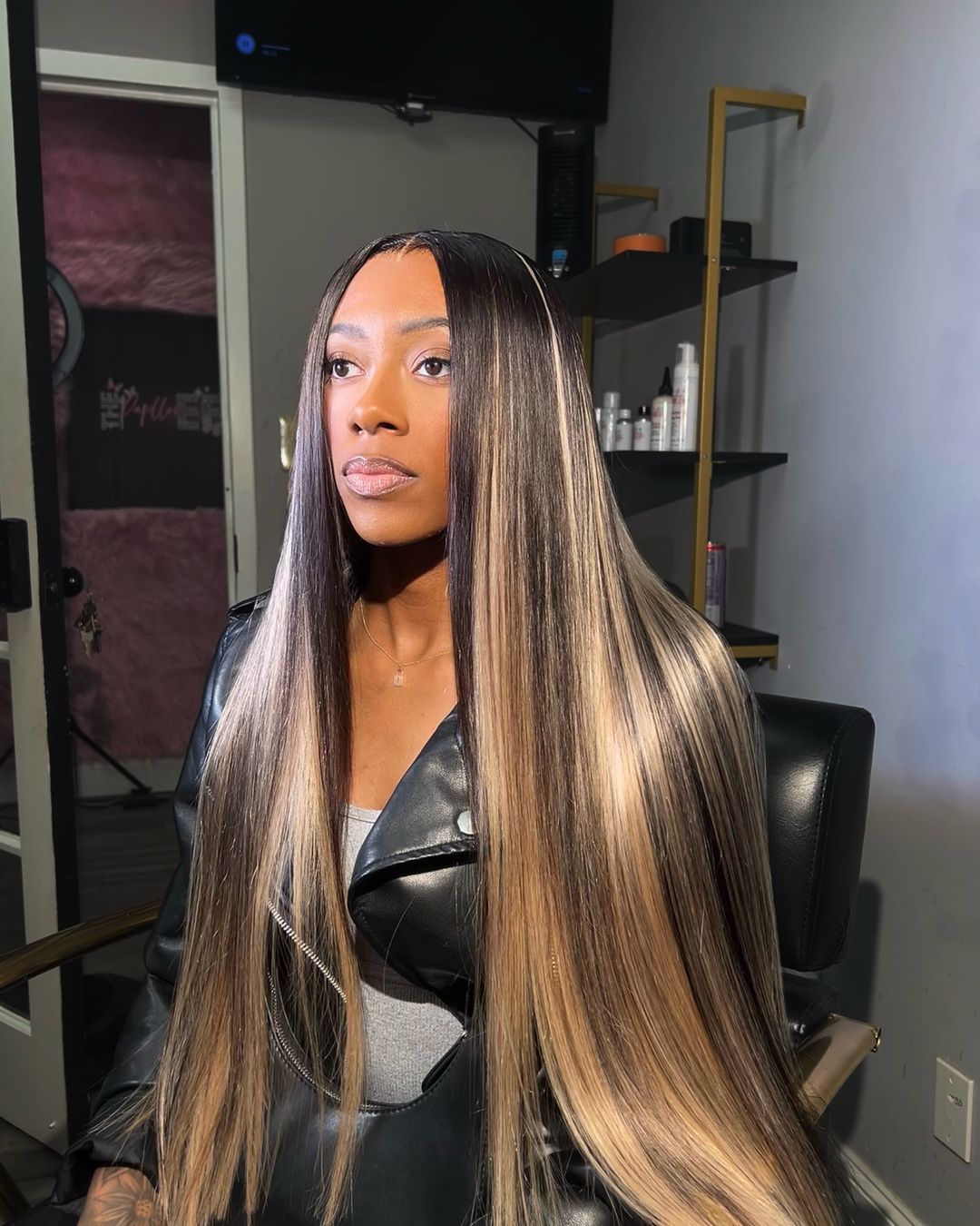 Long straight install with blonde highlights